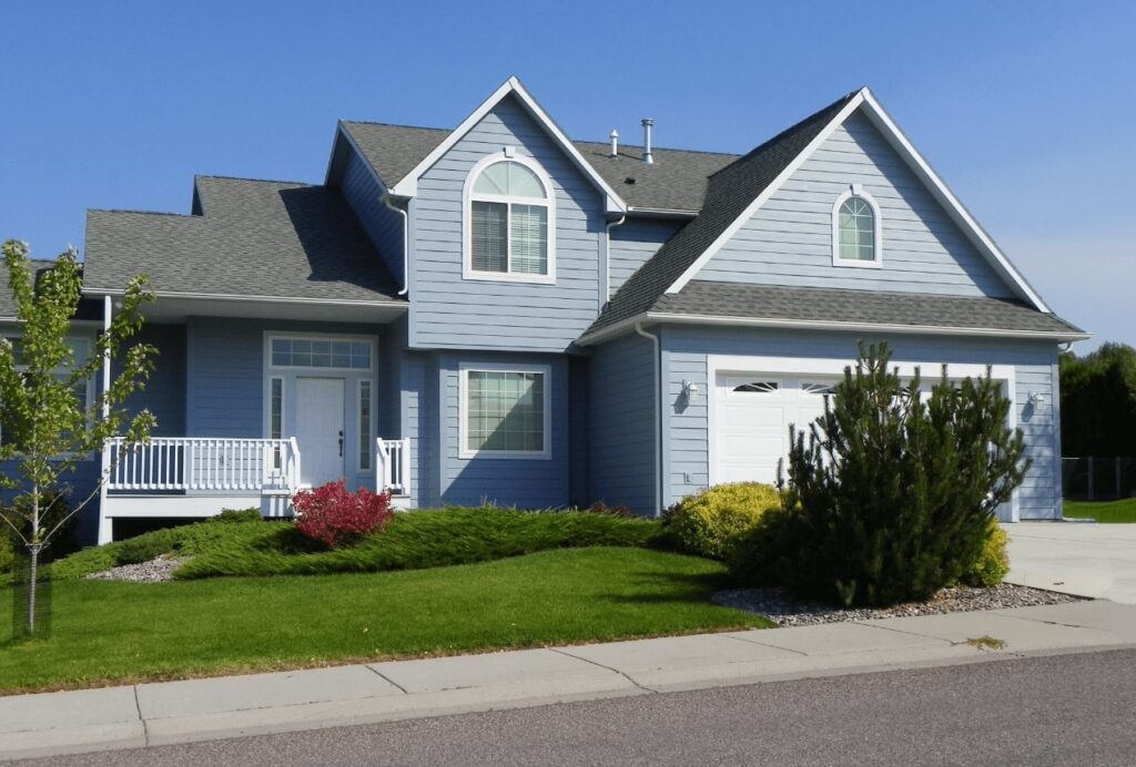 home with blue vinyl siding